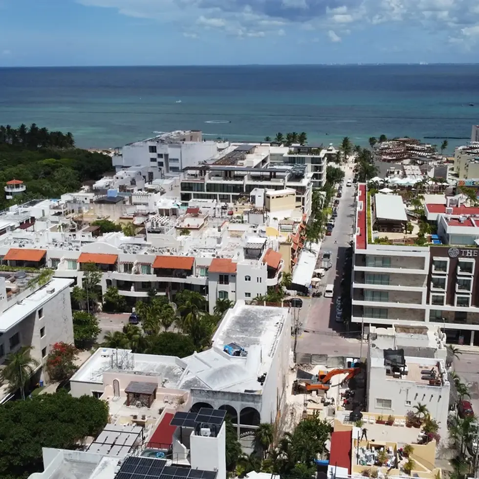 Costera Mamitas - Image of a Aerial View, featuring Oceanfront Cityscape and Rooftop Pools.