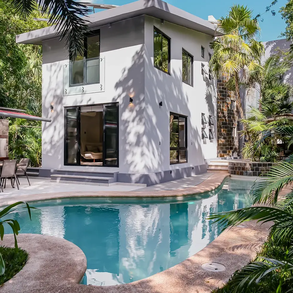 Modern white house exterior with private pool and patio