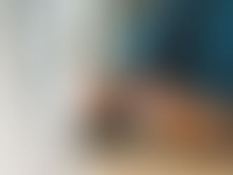 Person holding credit cards while reviewing financial information