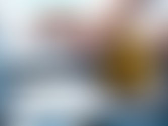 Person typing on laptop with cybersecurity warning icon, illustrating online financial data protection