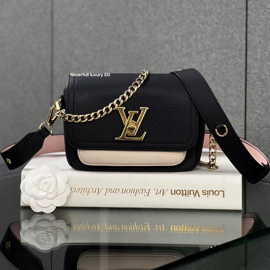 Black and pink Louis Vuitton crossbody bag
