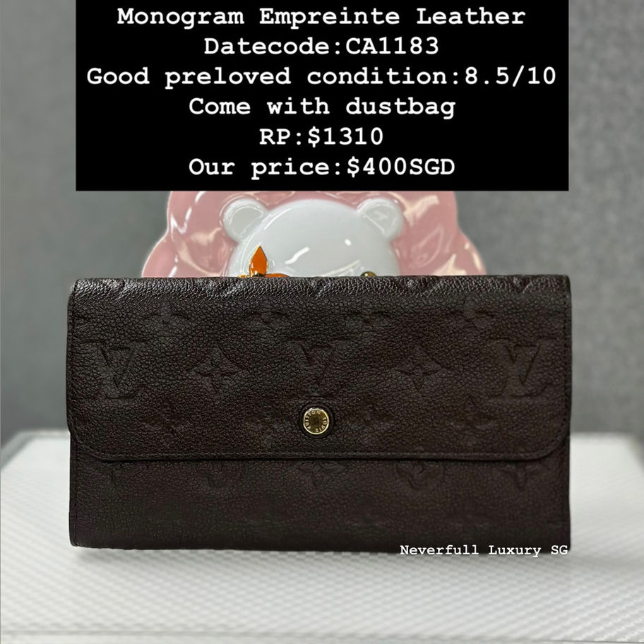 Brown Louis Vuitton monogram Empreinte wallet, CA1183, $400 SGD