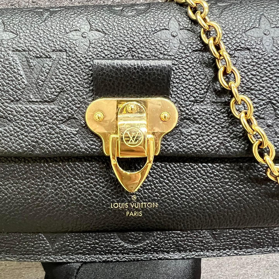 Black Louis Vuitton Twist PM M59405 handbag with gold chain