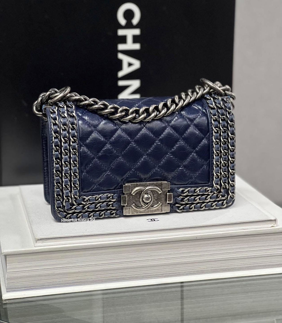 Navy blue Chanel Boy bag with silver chain detail