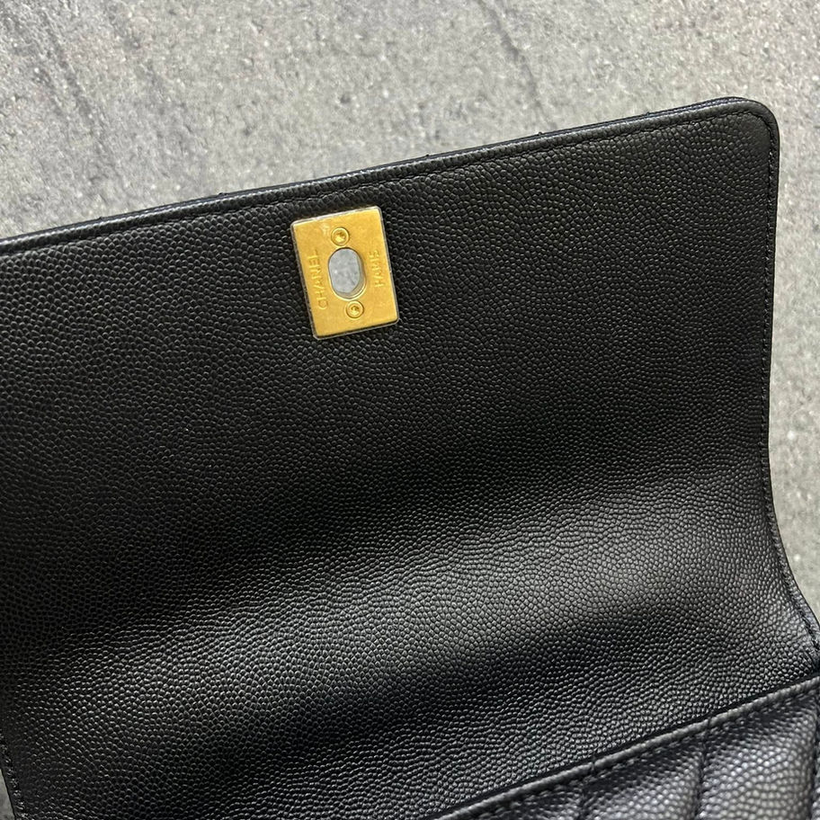 Chanel Small Coco Top Handle in Black Flap Close Up View