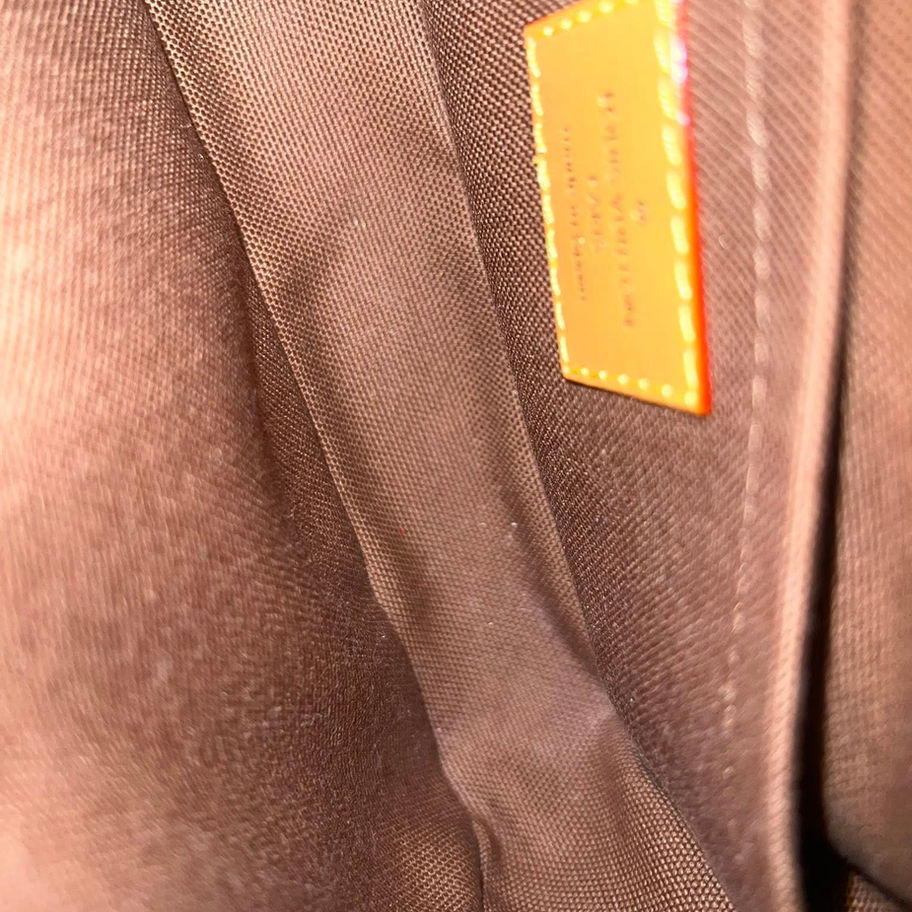 Louis Vuitton Trocadero Wearable Wallet Interior View