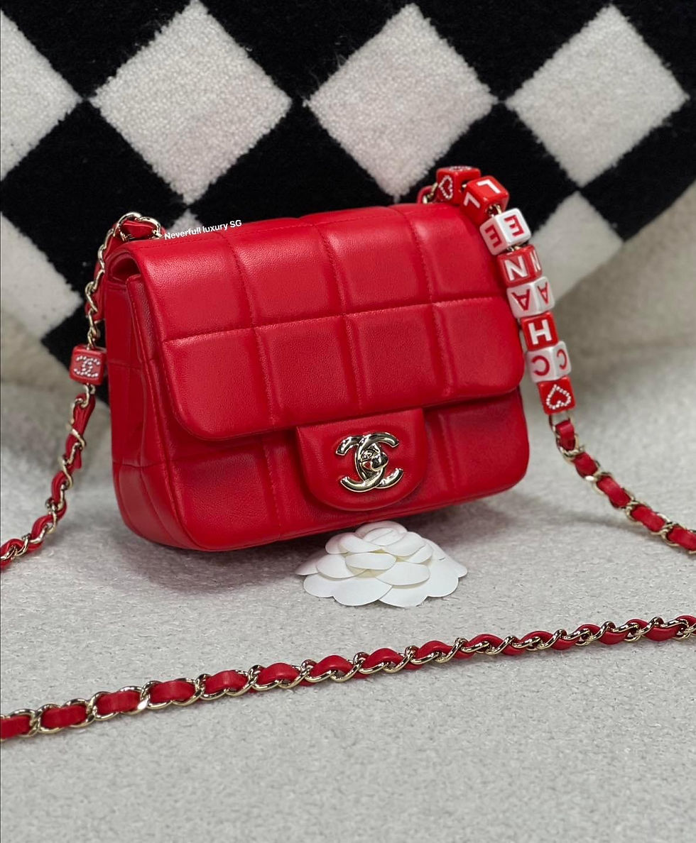 Red Chanel quilted handbag with chain strap