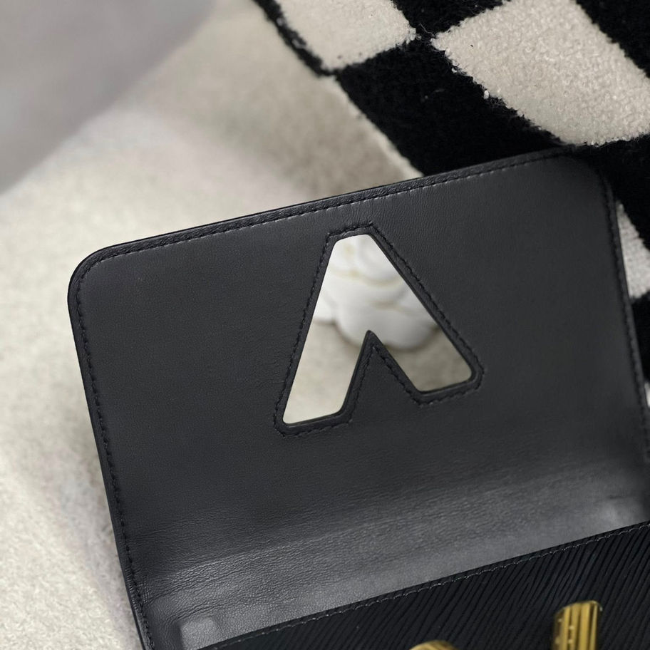 Louis Vuitton Twist PM in Black Flap Close Up View