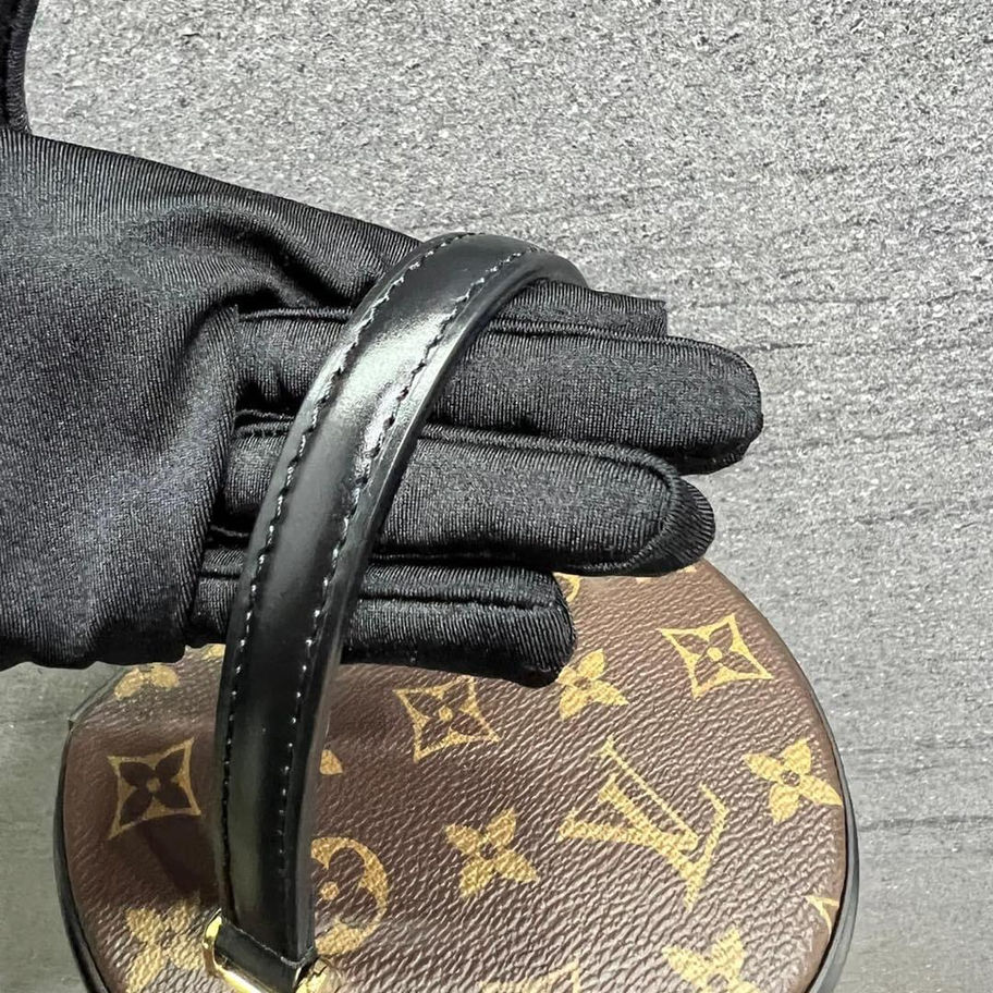 Louis Vuitton round purse with top handle