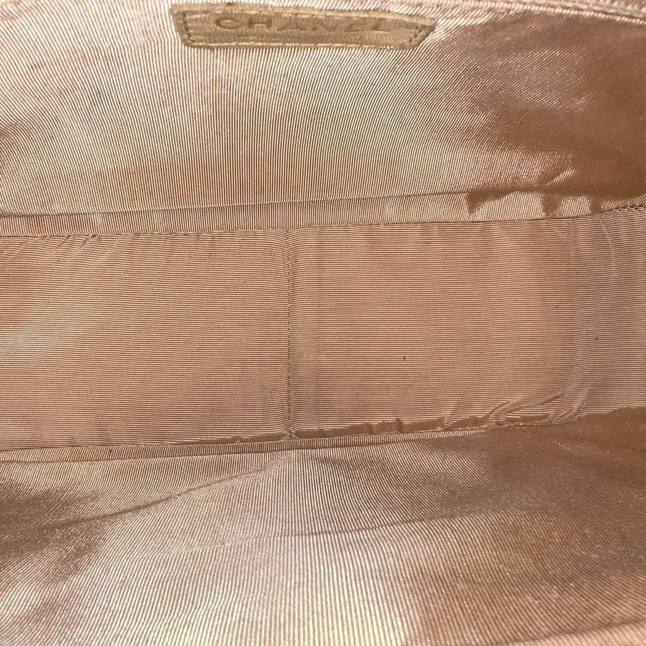 Chanel Mini Top Handle 24S bag interior, showing soft beige lining