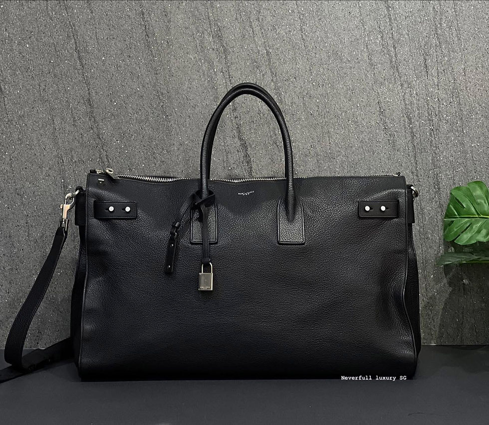 Black leather Saint Laurent travel bag