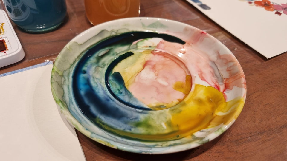Saucer repurposed as a watercolor palette