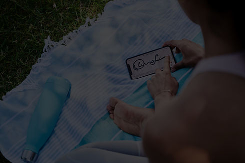 woman signing contract on DocuSign from phone_edited.jpg
