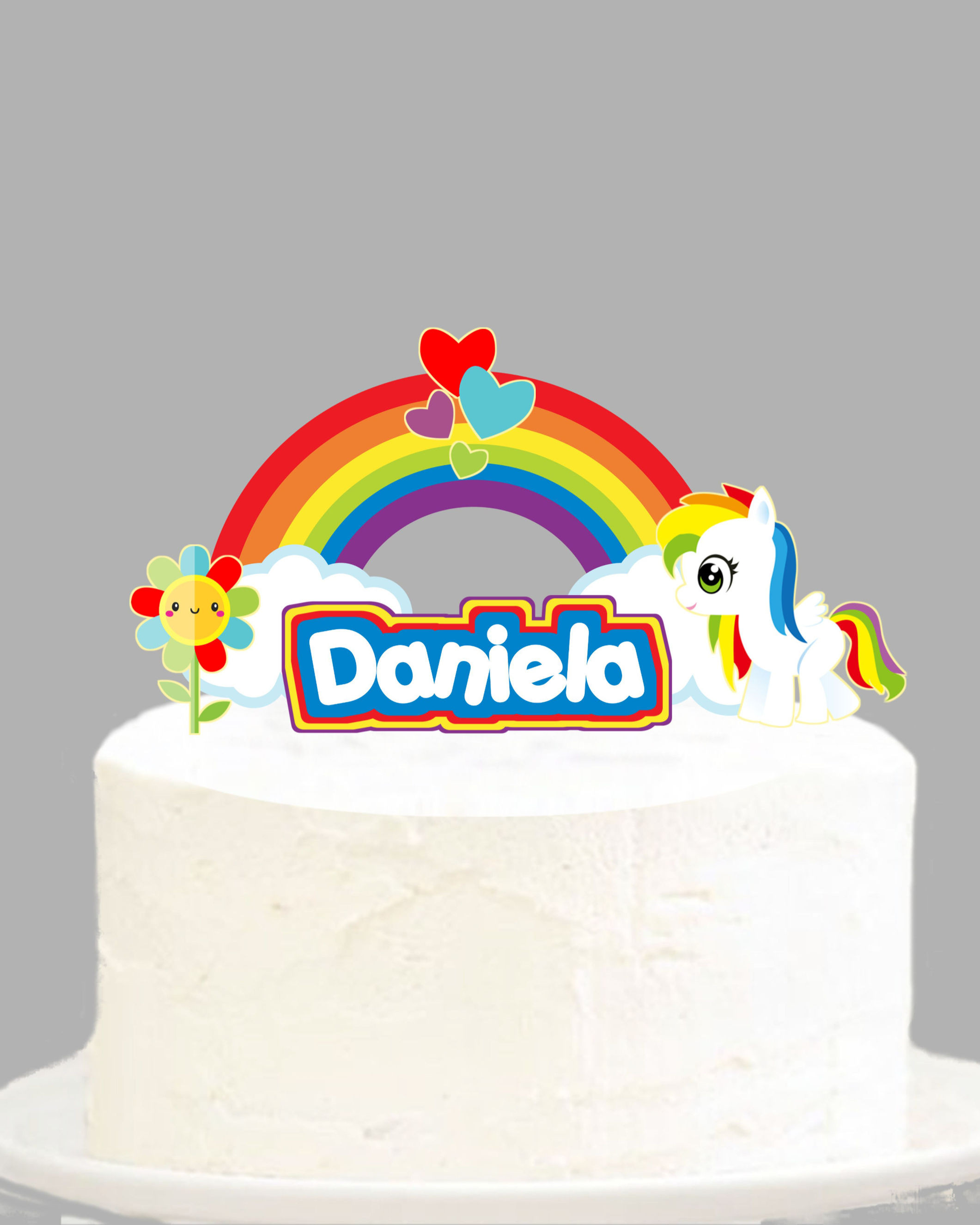 Topo de bolo arco-íris personalizado com unicórnio, corações e nome.