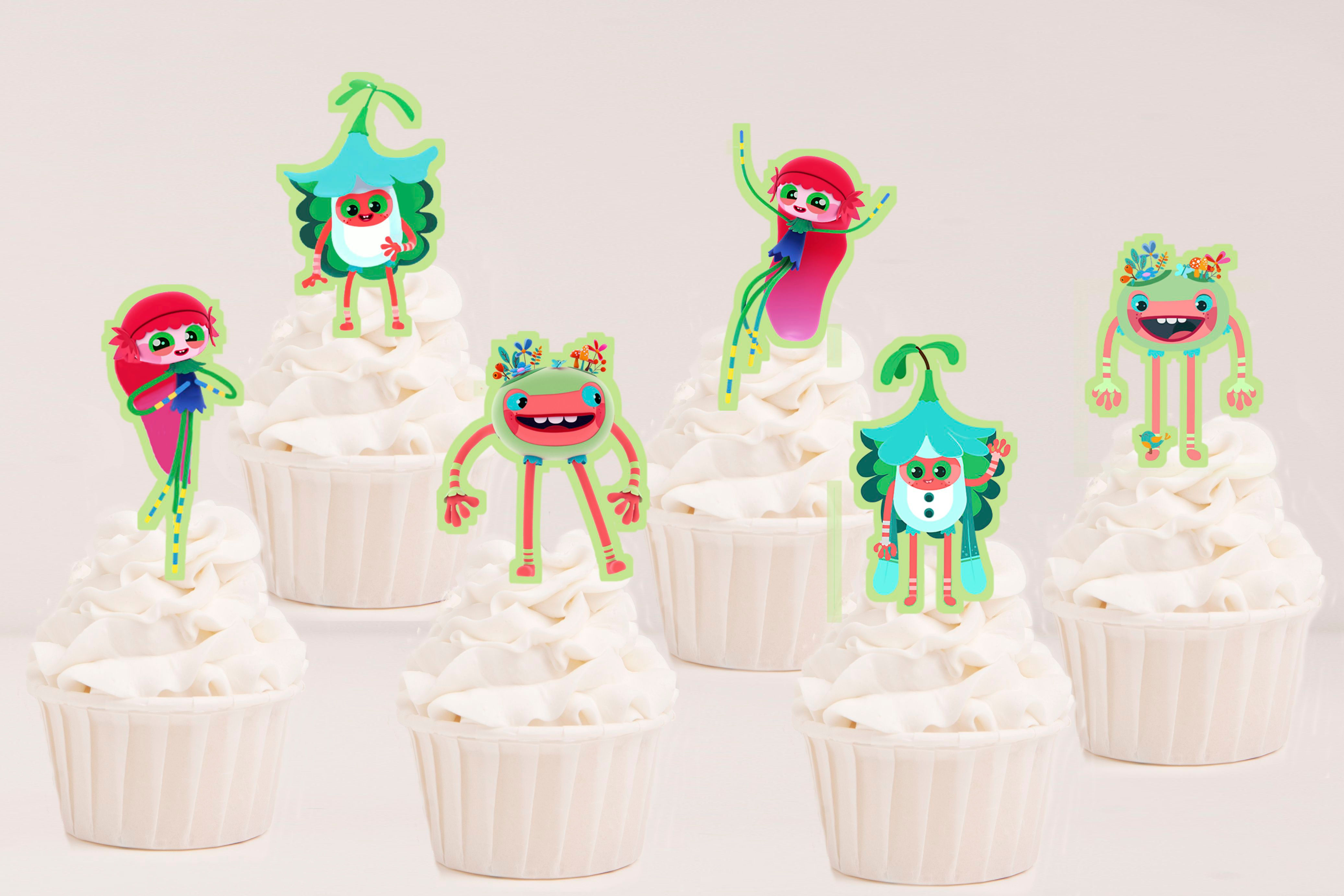 Toppers recortados do tema Lale Ki Lolu BabyTV aplicados em cupcakes para festa infantil.