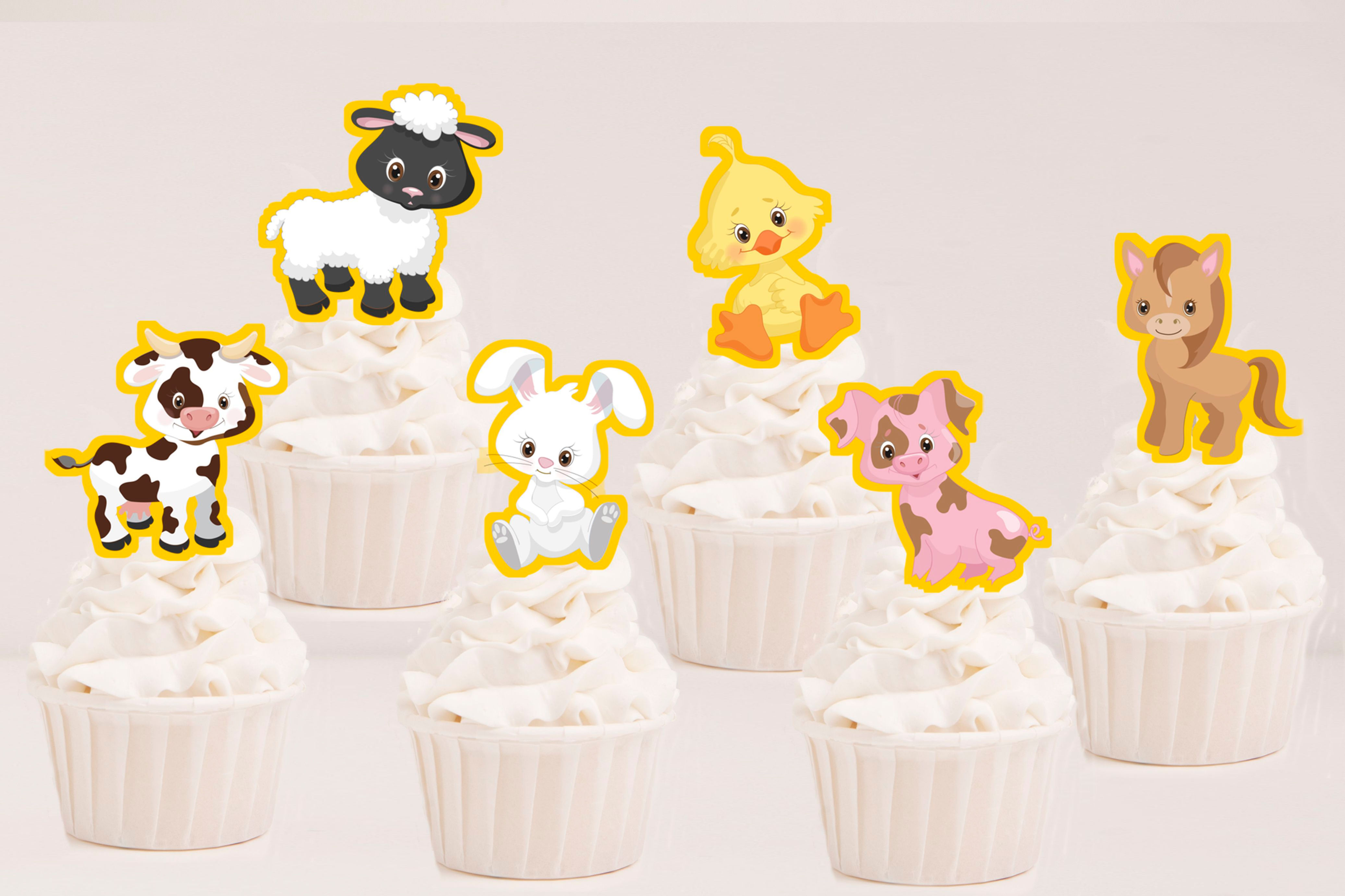 Toppers recortados Animais da Quinta aplicados em cupcakes para festa infantil temática.