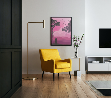 Pink monochromatic nature scene art in a frame. Hung above yellow chair in living room.