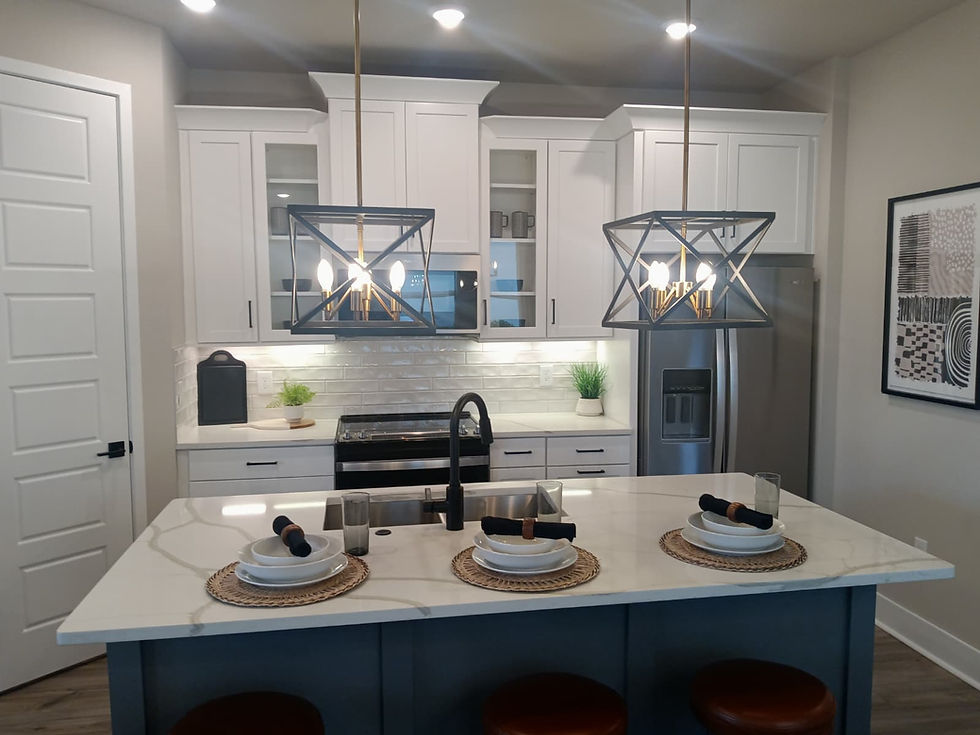 Modern kitchen with white cabinetry and island seating