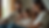 Eye-level view of a family sitting together in a living room