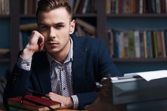 Anxious man staring while sitting