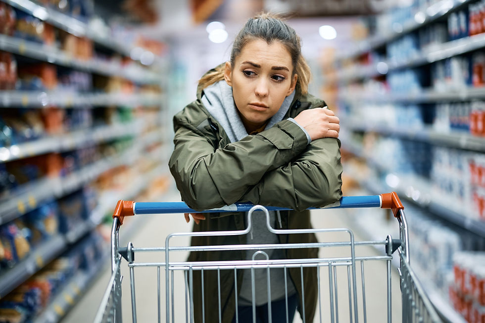 Sad Woman at grocery store