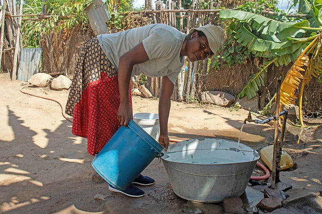 Mai rudo fetching water (2).jpg