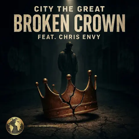 A cracked golden crown lies on a dark, deserted street, illuminated by a single overhead light. In the background, a hooded figure stands in the shadows with the text "City The Great - Broken Crown feat. Chris Envy" above.