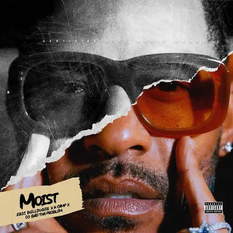 Torn-paper collage cover art showing Eric Bellingers’s face split between grainy black-and-white and color, wearing tinted sunglasses with his hand against his cheek. Textured scratches overlay the image, and a beige label reads “Moist” with Eric Bellinger, K Camp, and DJ BAD THA PROBLEM credits.