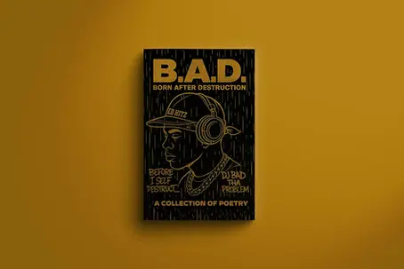 Black and gold book cover titled “B.A.D. Born After Destruction: A Collection of Poetry,” featuring a line drawing of a DJ BAD THA PROBLEM wearing a cap labeled “Ed Hitz” and large headphones.