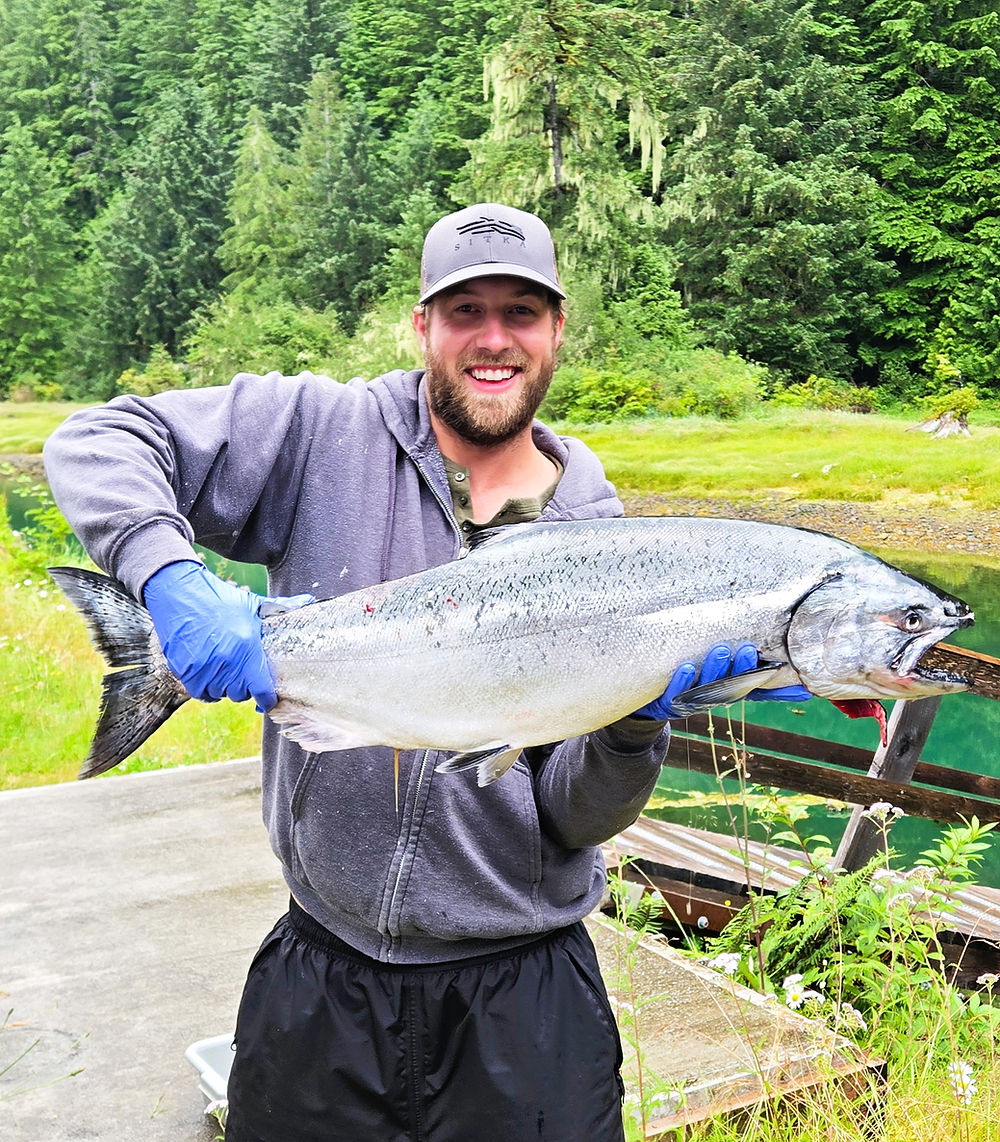 Man with large fish from Nootka Sound Sportfishing Charter