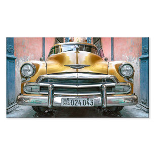 a yellow antique 1951 Chevrolet car in Havana, Cuba 