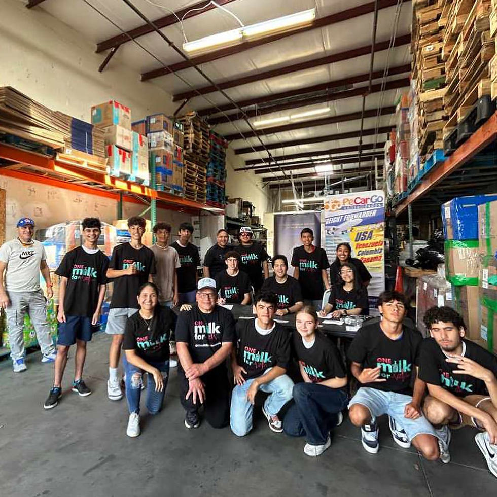 Foundation for children in Florida and Venezuela volunteers in a warehouse