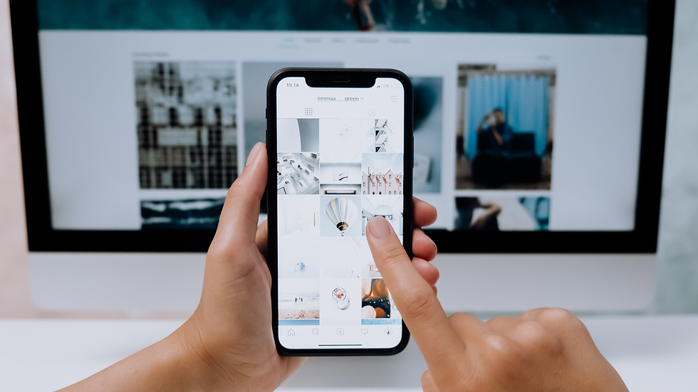 Person scrolling on a white minimalist Instagram feed.
