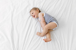 Niño en la cama