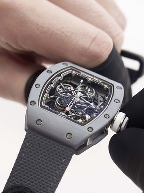 Richard Mille RM 55-01: Ultra-Light Titanium Sports Watch with Minimalist Hand-Wound Movement and TPT Case