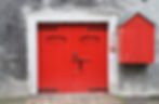 Red doors: The distillery’s bold red doors have become a brand trademark.