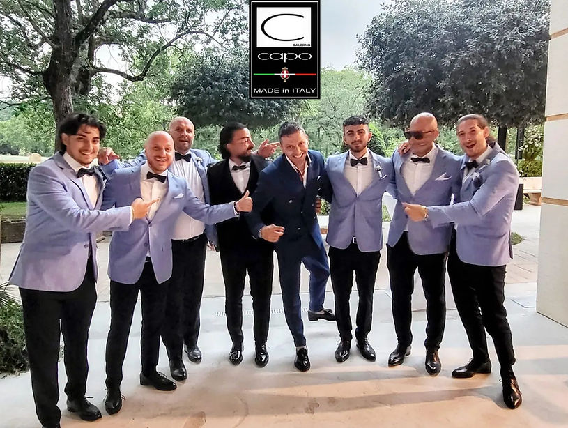 Groom's Wedding Party - 6 groomsmen in matching custom suits, with the groom and Capo owner, Paolo, in the centre