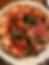 Pizza with lots of colorful veggies on top