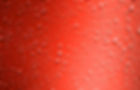 Water droplets on an orange background with grey overlay