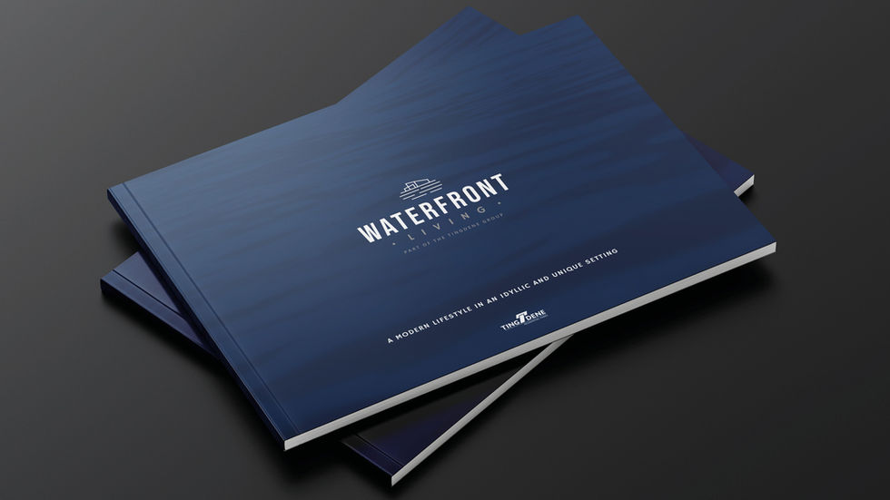 Brochure cover for Waterfront Living floating homes featuring contemporary logo and rippling water.