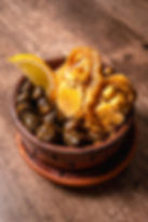 Egyptian halal beef trotters with stuffed grape leaves, authentic Mediterranean dish Houston