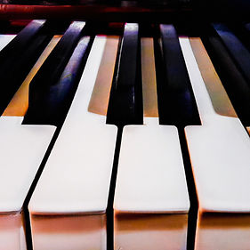 Closeup of a few piano keys