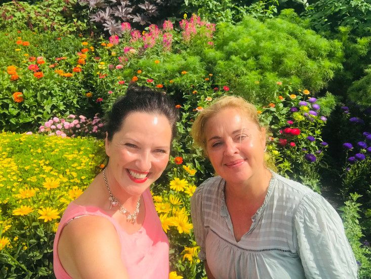 Victoria, founder of Cotswold Teacup Tours, with a guest at Aston Pottery near Bampton, Oxfordshire, in summer