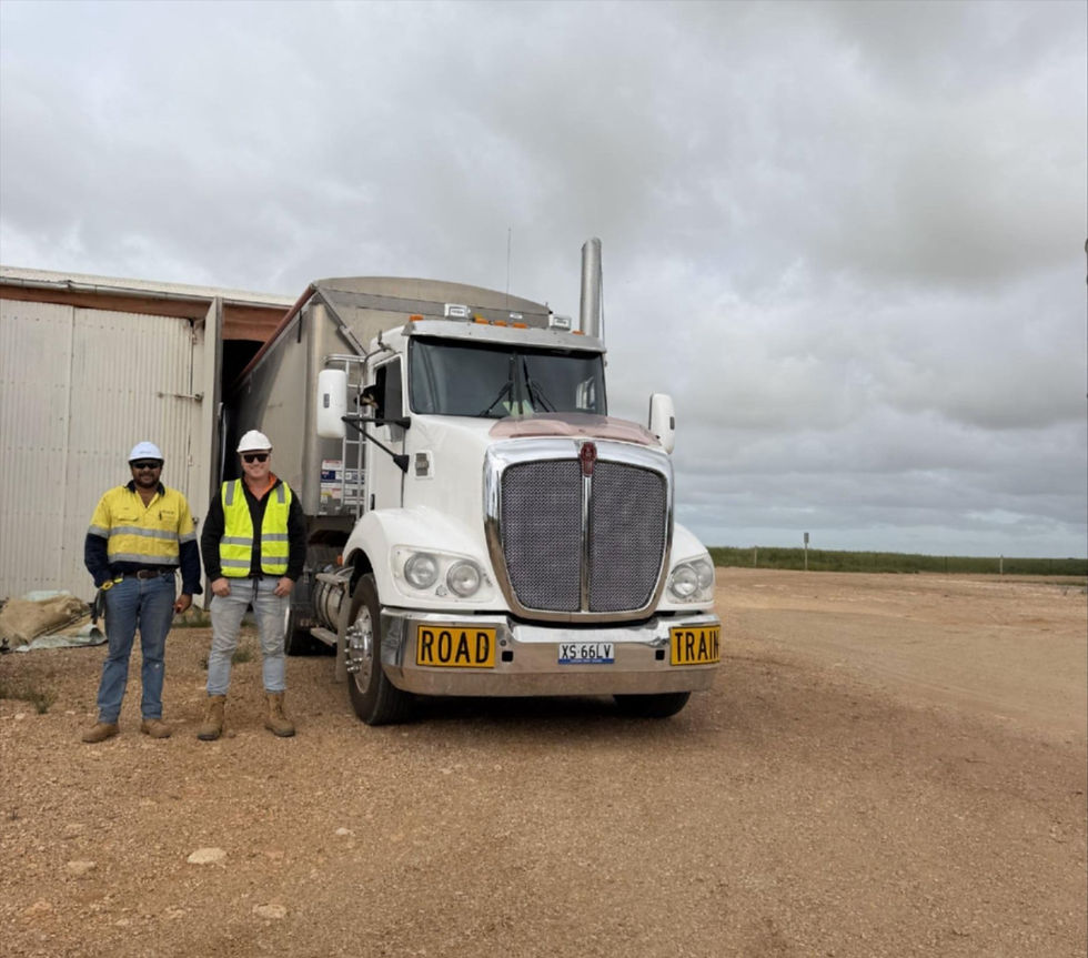 Bunge employee, Casey Bailes with carrier, Elgan Rees, documenting the first delivery to Port Neil as harvest gets underway across SA and Western Victoria. IMAGE: Bunge