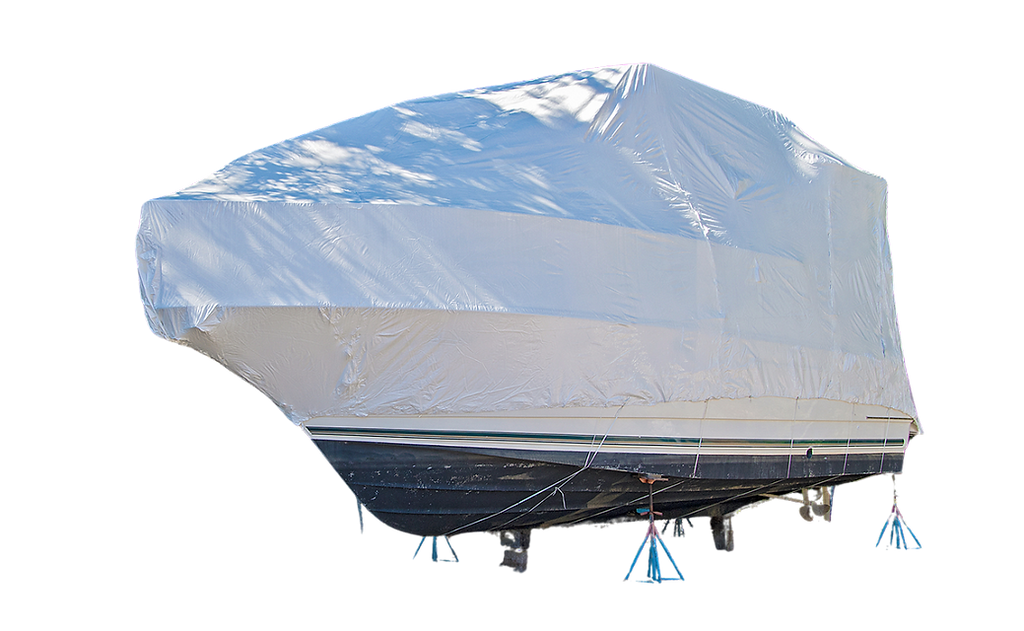 Large, covered boat on blocks with a transparent background