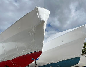 Two winterized boats at Noank Shipyard in Groton, CT