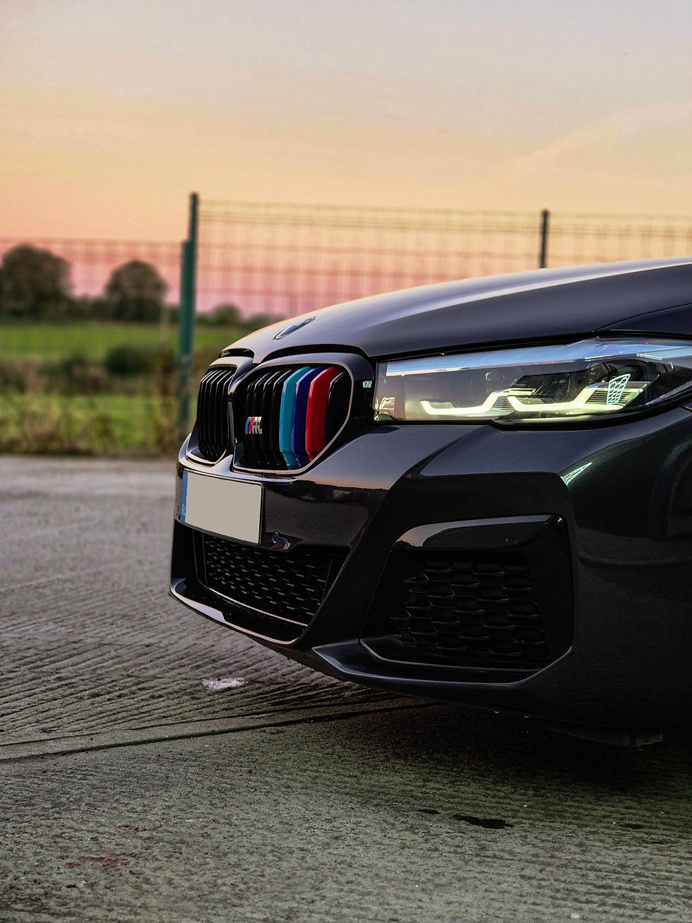 Detailed BMW bonnet with clear reflection, showing flawless finish after exterior detail.
