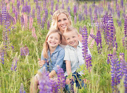 mom and her 2 littles in the lupines
