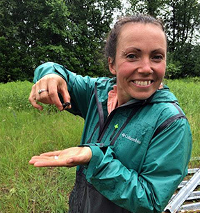 Kelly holding a bug