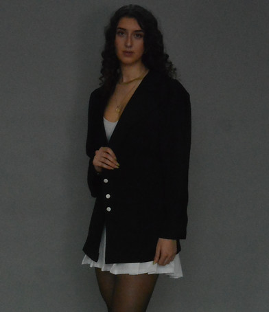 blazer wore by model emphasizing sleeve